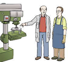 Ein Mann zeigt einem anderen Mann die Maschine, wie man diese bedient