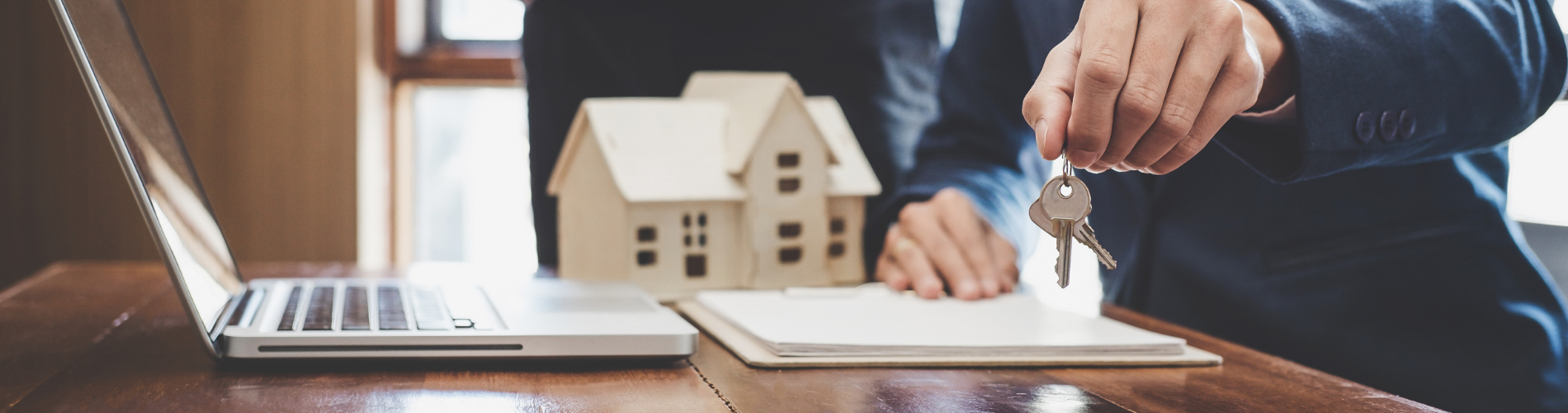 Schlüsselübergabe für ein Haus